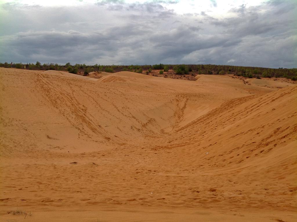 Is it worth visiting Mui Ne - Red Sand Dunes Mui Ne with a dark cloudy sky