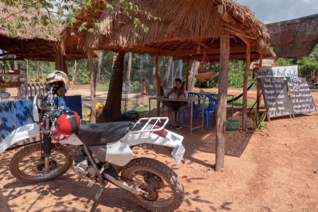Exploring Kampot Caves Photo of dirt bike while having lunch near the secret lake Kampot