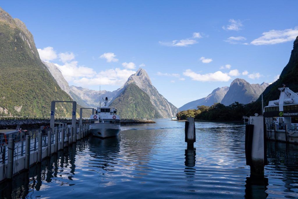 The jetty at Milford Sound with Tour boats